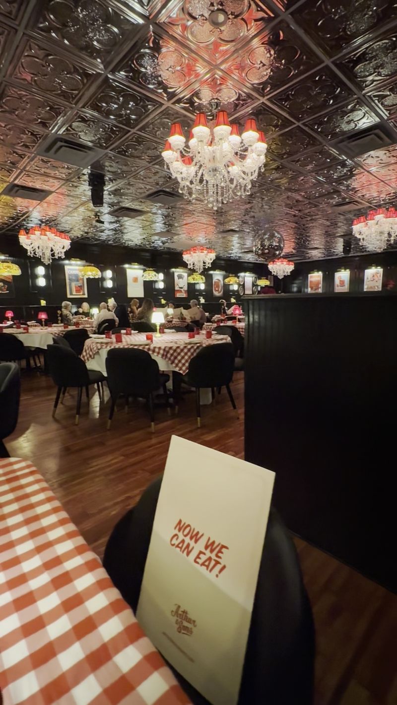Chandeliers Overhead, Checkered Cloths Below Chandeliers Overhead, Checkered Cloths Below