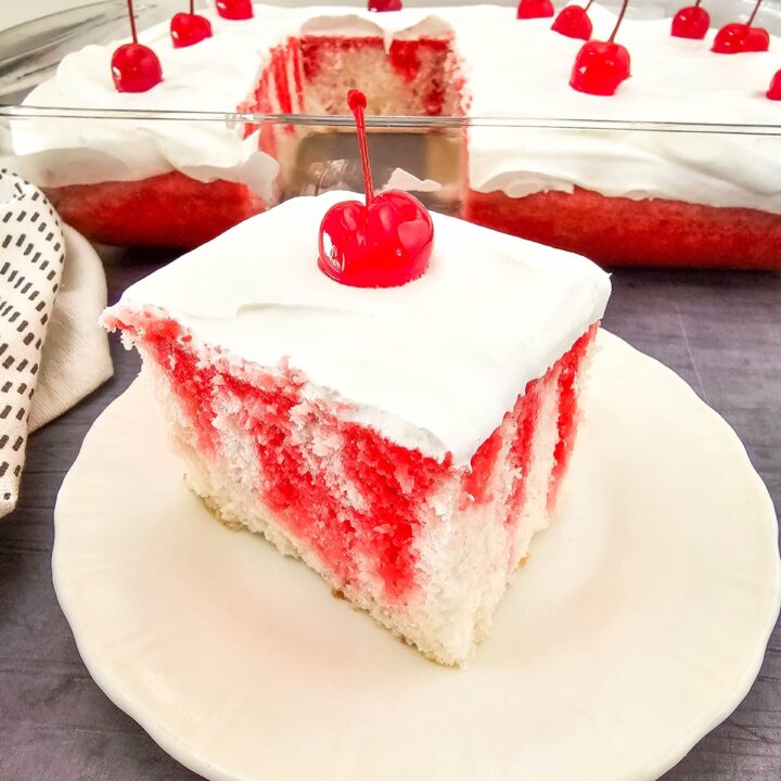 You will need the following items to make this recipe: Measuring cups, large bowl and mixer or stand mixer, silicone spatula, 9x13 cake pan, skewer sticks or large fork, medium saucepan, whisk Ingredients: ● 1 box (13.25 oz) white cake mix, plus ingredients listed on the box (ours called for 1 ¼ cups water, ½ cup oil, 4 eggs whites) ● 3 oz box cherry Jell-O ● 1 cup boiling water ● 1 cup cold water ● 8 oz whipped topping ● 12 maraschino cherries Directions: 1. Preheat the oven to 350 degrees, and grease a 9x13 inch baking dish. 2. In a large bowl, beat the cake mix, water, oil, and egg whites for 3 minutes. 3. Bake for 35 minutes, or until a toothpick inserted into the center of the cake comes out clean. 4. Remove the cake from the oven, and allow to cool for 5-10 minutes. 5. Poke holes all over the cake every ½ inch or so using a skewer stick or large fork. 6. Prepare the jello by bringing 1 cup of water to a boil, and stirring in the gelatin until dissolved. Stir in another 1 cup of water, and whisk for 3 minutes. 7. Slowly pour the prepared liquid over the cake, allowing it to absorb into the holes. 8. Refrigerate for 4 hours. 9. To serve, top with whipped topping and maraschino cherries.