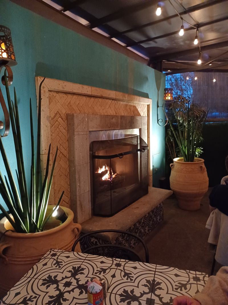 The Cozy Patio With Fireplace Charm