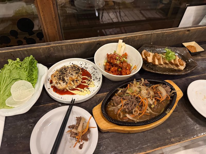 Colorful Small Plates And Fresh Banchan Sides