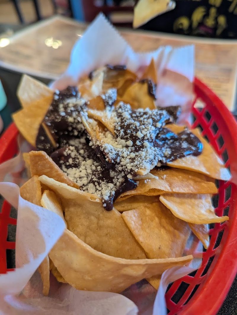 Complimentary Chips With Beans And Cheese