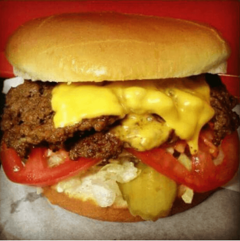 Why Regulars Swear This Burger Is Worth The Drive