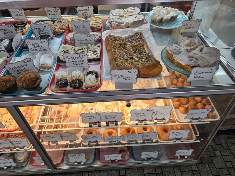 A Bakery Case Packed With Pastries 