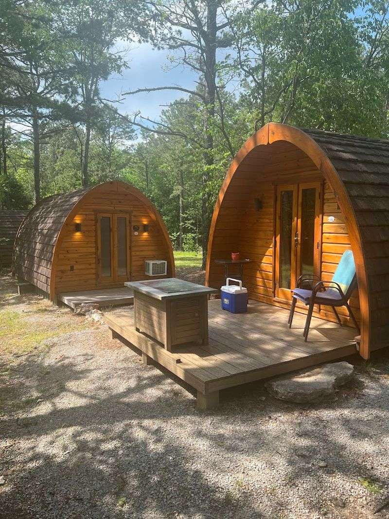 Cozy Pods Surrounded By Tall Trees