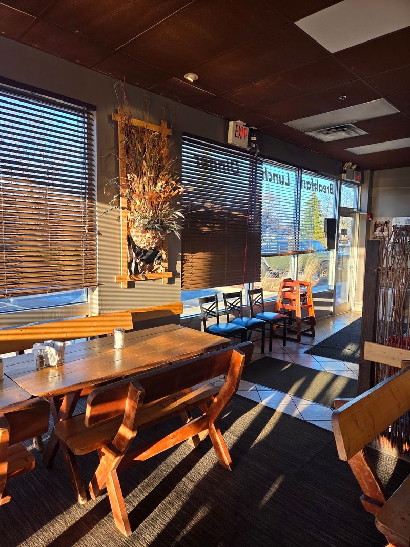 Cozy Tables And A Play Corner For Little Ones