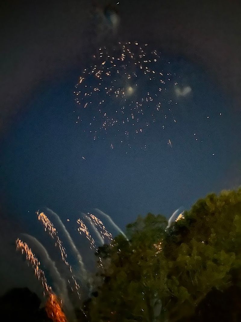 Crowds Gather As The Evening Sky Deepens