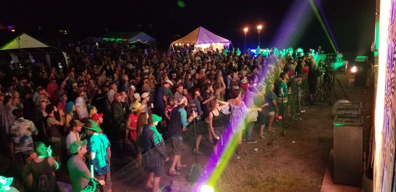 Crowds Gather Beneath The Ozark Sky