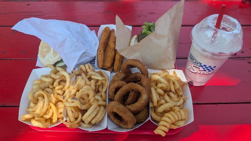 Curly Fries And Onion Rings That Earn Their Spot Curly Fries And Onion Rings That Earn Their Spot