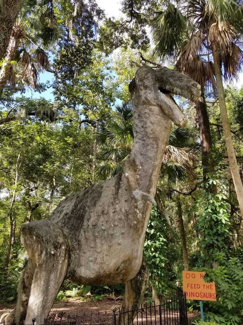 Dinosaurs Lurking Behind The Palms
