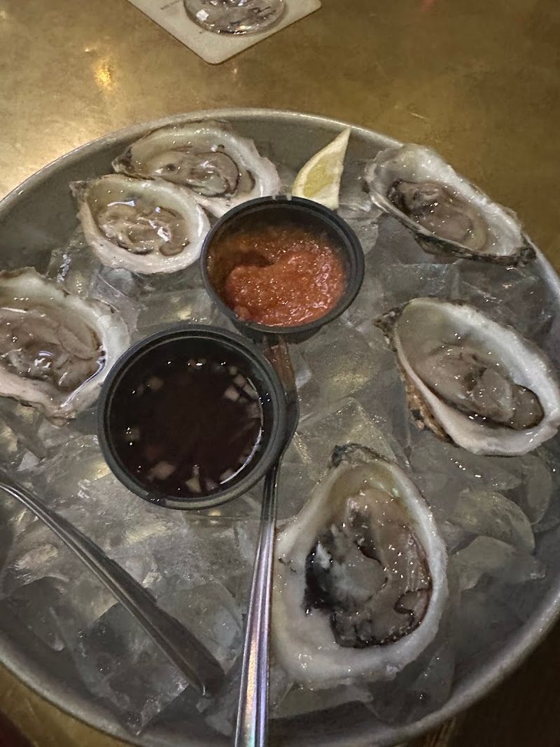 Dollar Oysters Shucked Fresh Right Before Your Eyes
