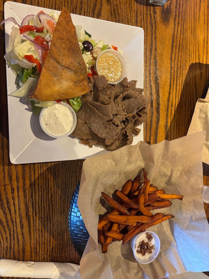 Generous Platters Loaded With Gyro Meat Rice And Fresh Salad