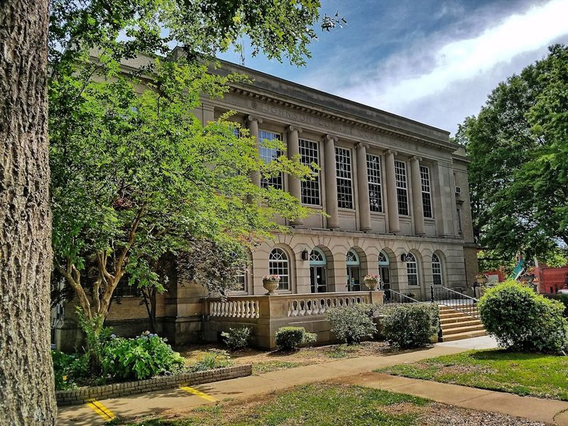 A Small Downtown With Antique Shops And Historic Brick Buildings