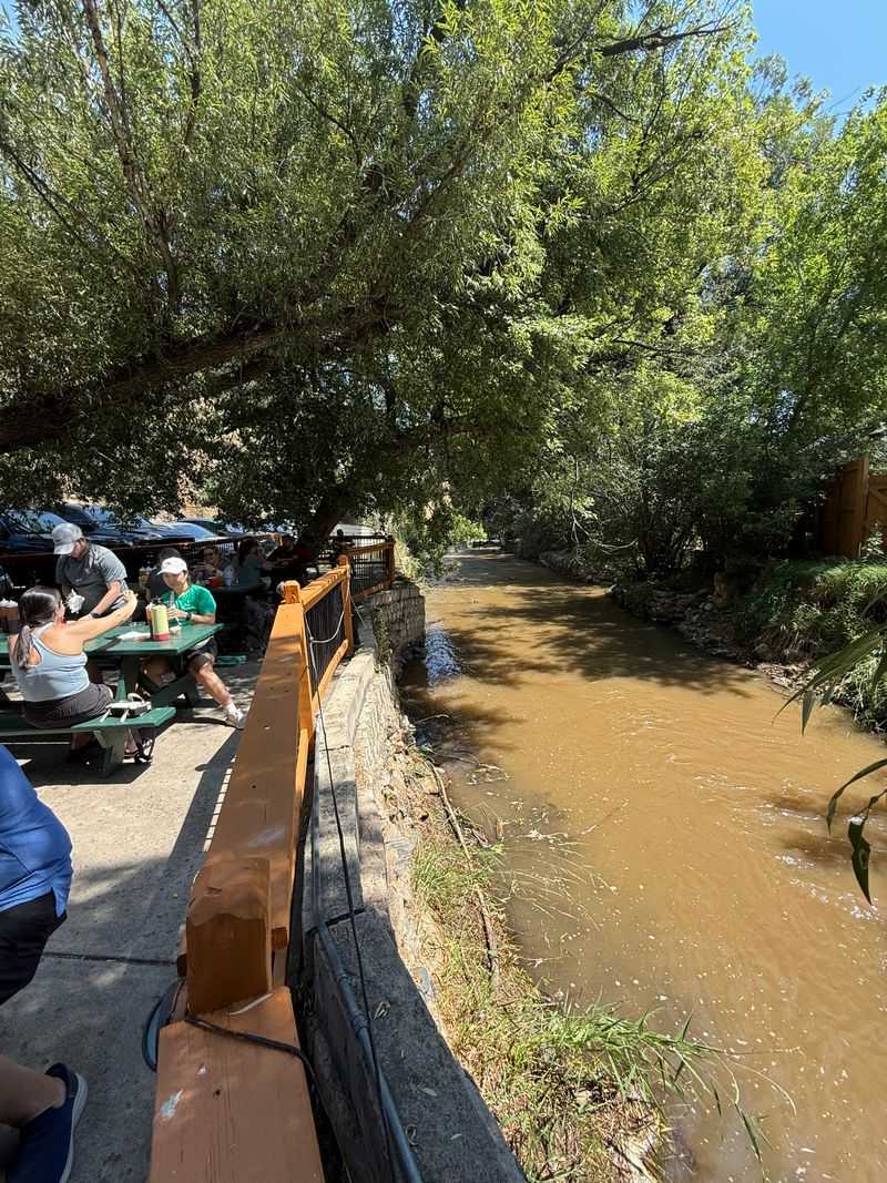 Atmosphere, seating, and the creekside rhythm