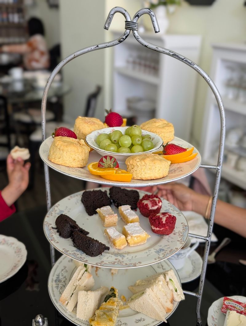 Finger Sandwiches, Quiche, And Tiny Cakes On The Tower