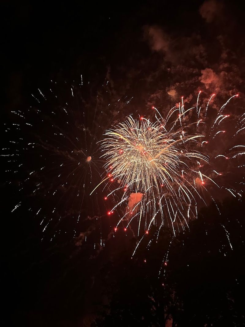 Fireworks Burst Above The Ozark Hills