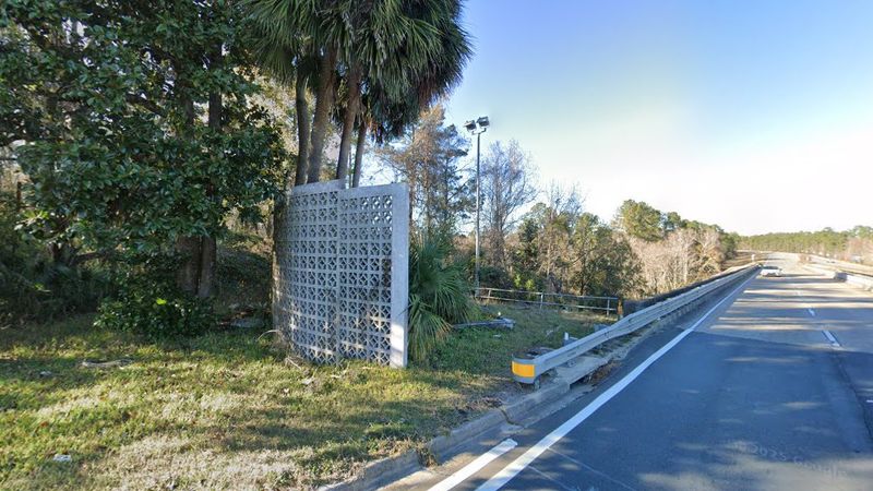 A Sign With Stories In Its Bolts