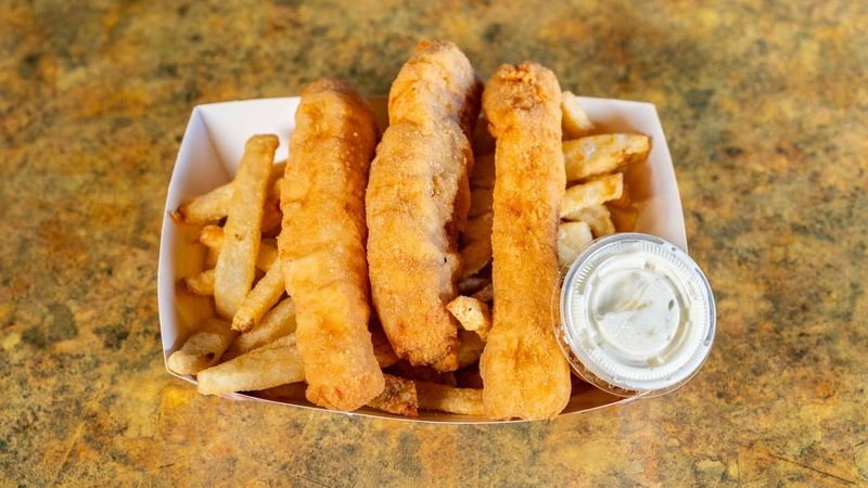 Fish And Chips With A Tartar Sauce Following