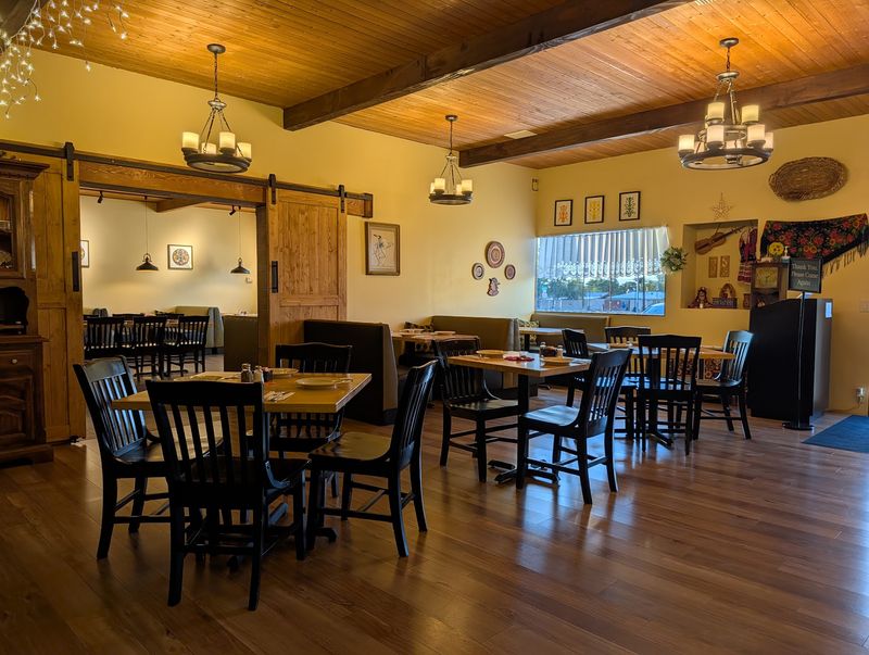 Folk Art, Wood Beams, and Mountain Views Folk Art, Wood Beams, and Mountain Views