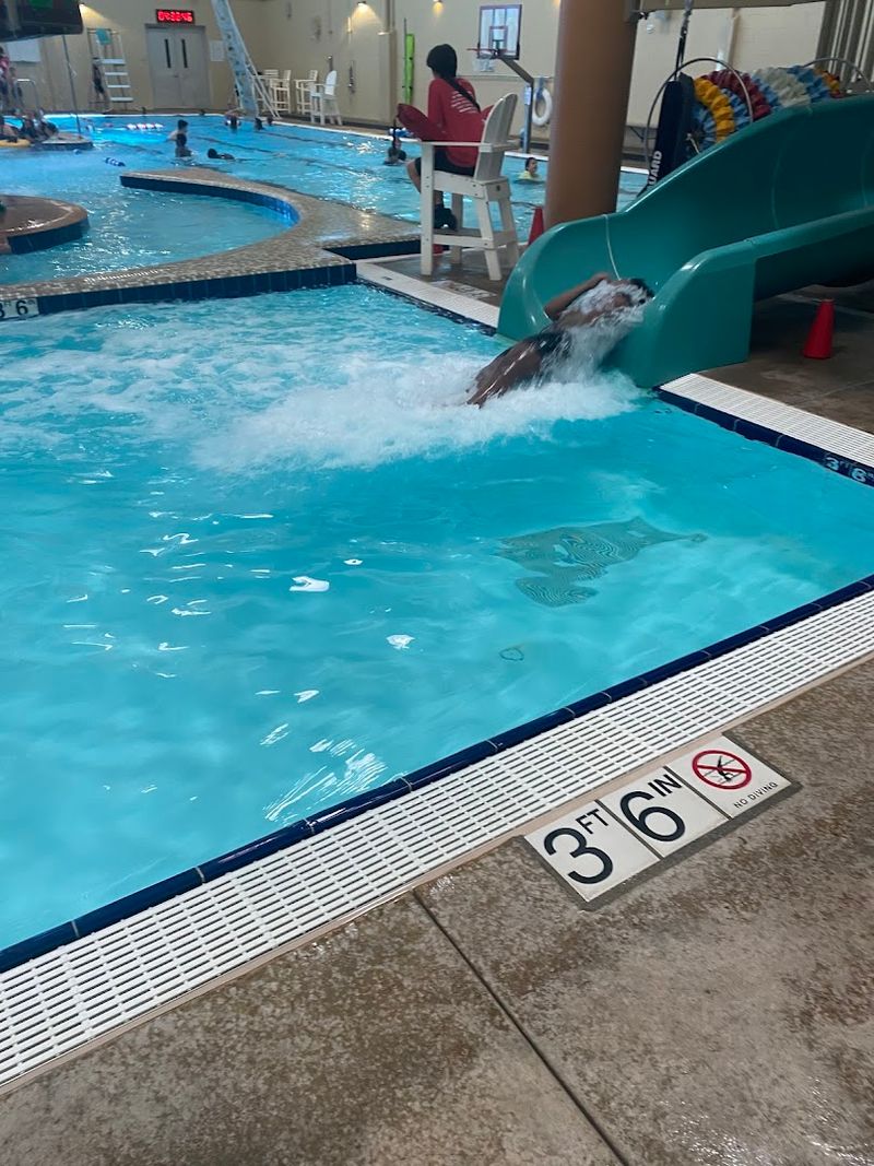 Free Swim Area With Basketball Hoops And A Climbing Wall