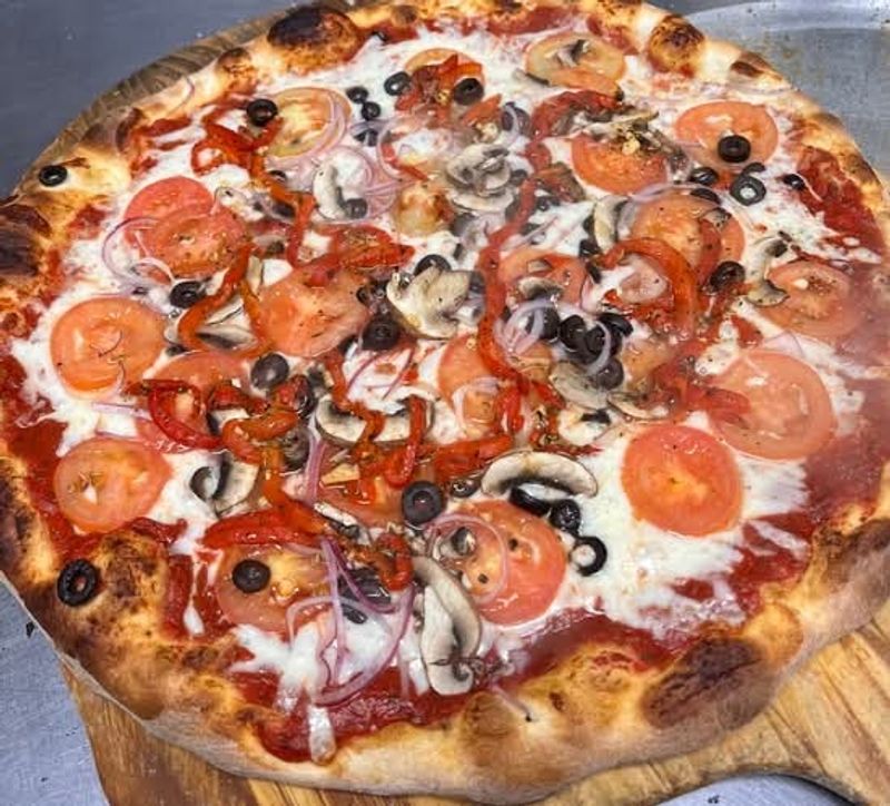 Fresh-Made Pizza Crust That Earns Its Reputation Fresh-Made Pizza Crust That Earns Its Reputation