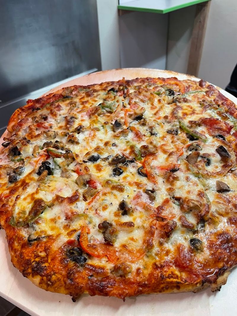 Fresh Pizza And Snacks At Shankz