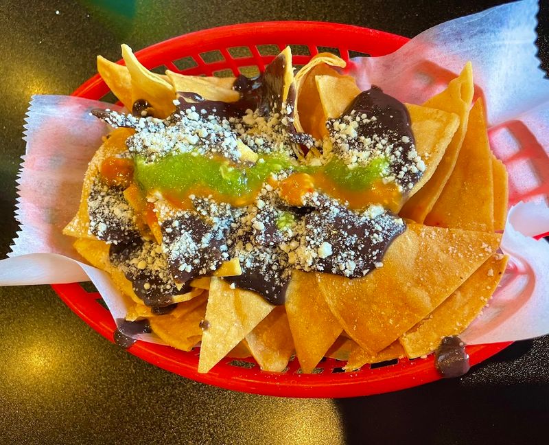 Complimentary Chips With Beans And Cheese