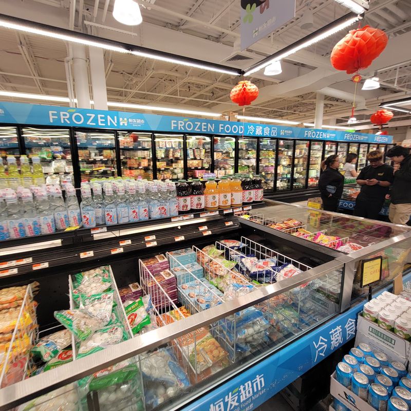 Frozen Section, Snacks, And Hello Kitty Cookie Tins
