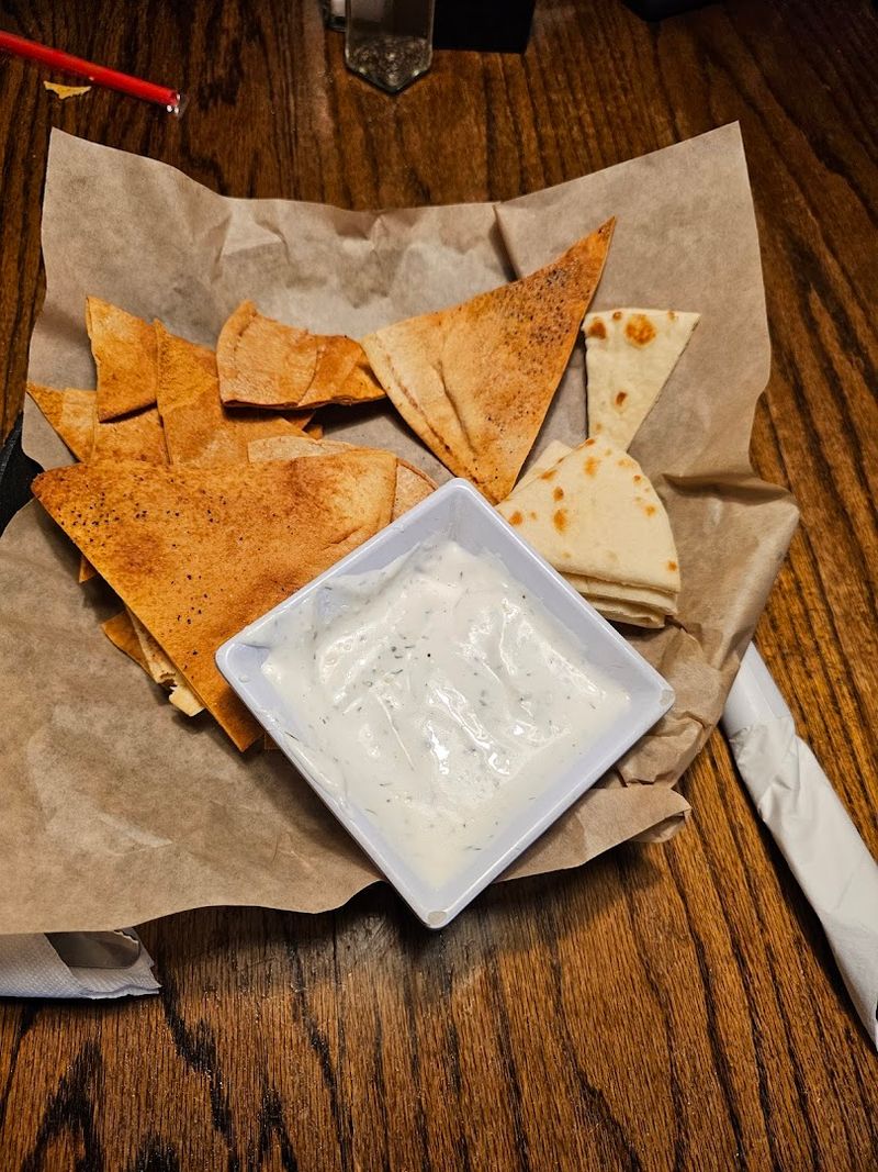 Warm Pita Creamy Tzatziki And Bold Mediterranean Flavors