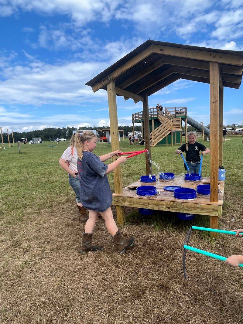 Giant Bubbles, Slides, And Paintball Fun