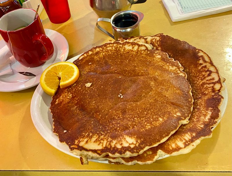 Giant Pancakes, Hash Browns, and a Legendary Cinnamon Roll Giant Pancakes, Hash Browns, and a Legendary Cinnamon Roll