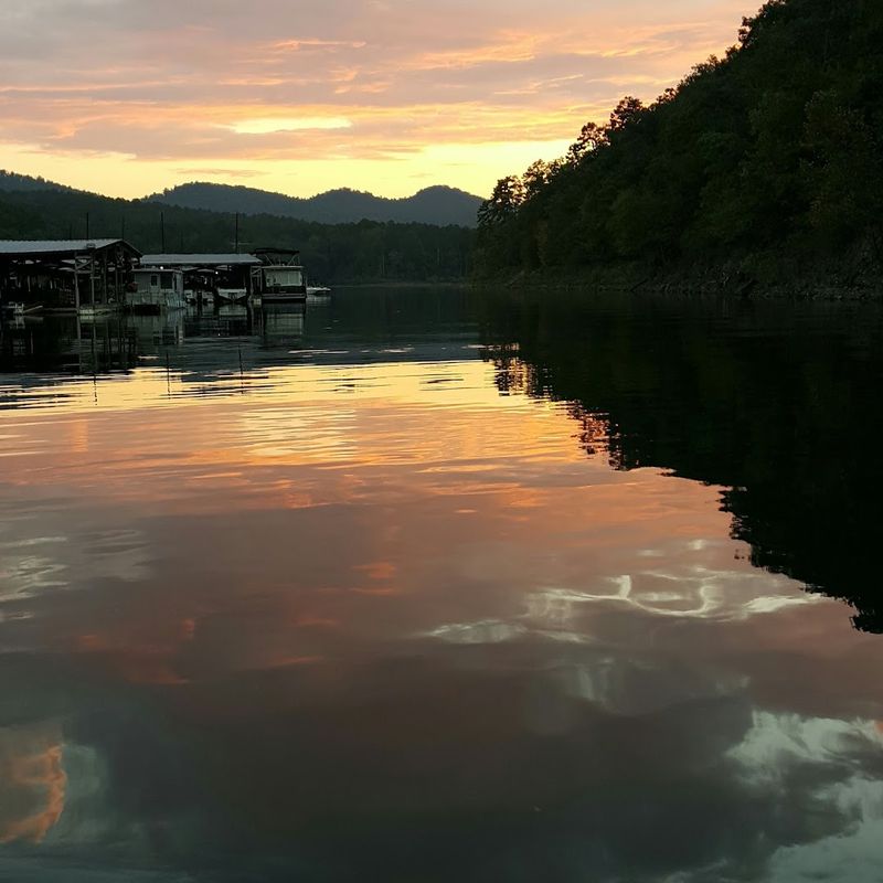 Sunrise Mist And Golden Hour Reflections Across The Lake