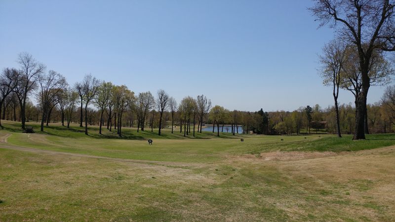 Golf Greens Roll Toward The River