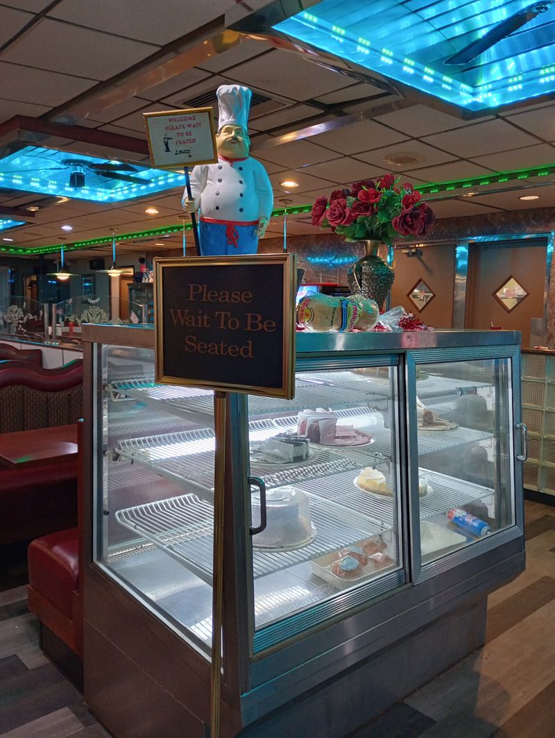 Rotating Dessert Case Loaded With Oversized Pies