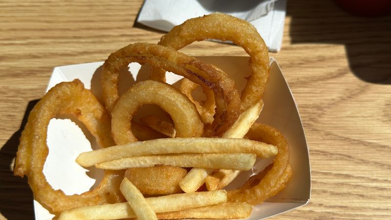 Hand-Battered Onion Rings Are The Real Star