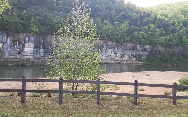 Campsites Set Beneath Amber Glowing Cliffs