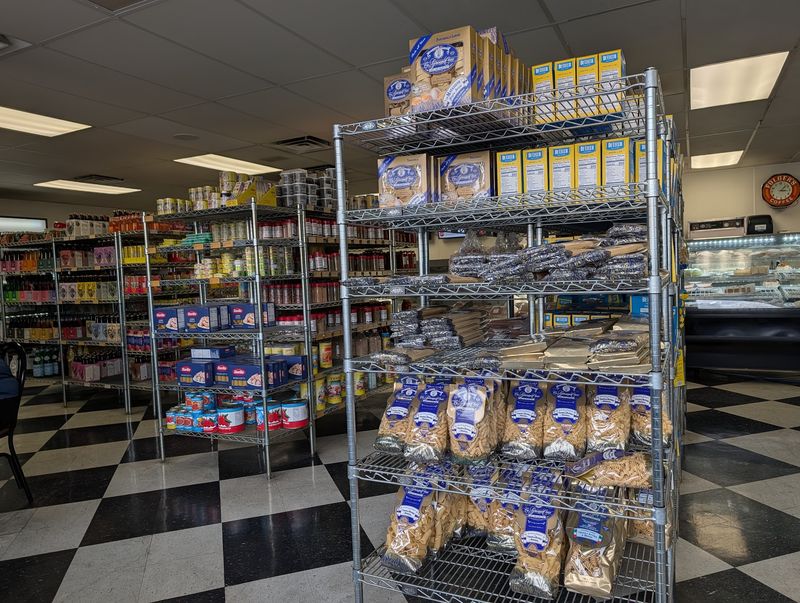 Italian Grocery Shelves Extend The Valente Visit