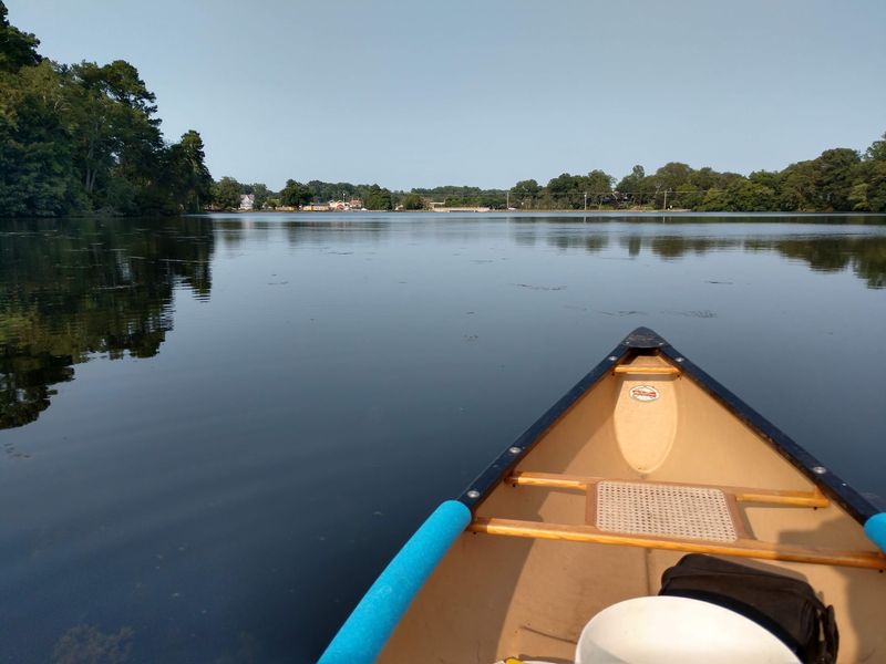 Kayaking And Paddling On Calm, Beautiful Water Kayaking And Paddling On Calm, Beautiful Water