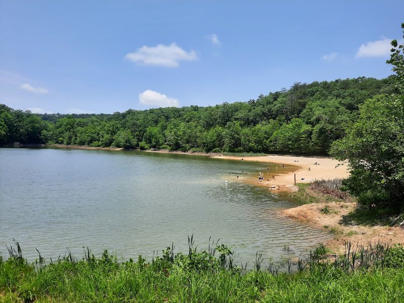 McKamy Lake's Sandy Beach And Crystal-Clear Swim Area