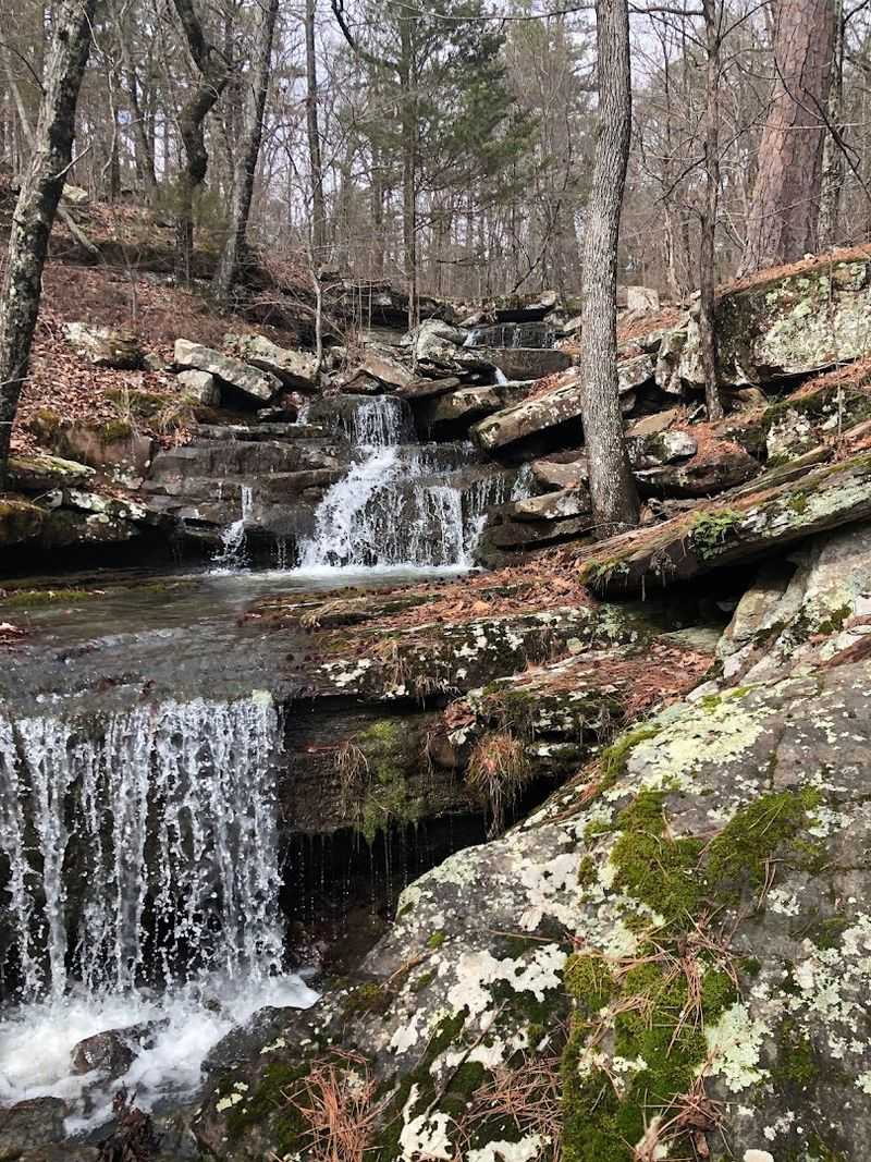 Mossy Rocks Beside Falling Water