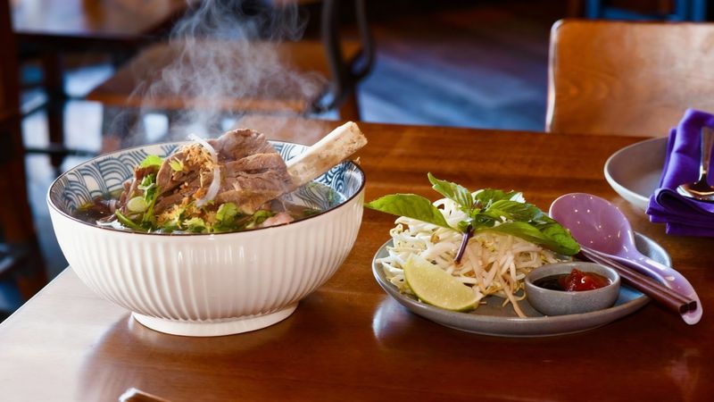 Noodle Bowls Layered With Rich Broth And Fresh Herbs