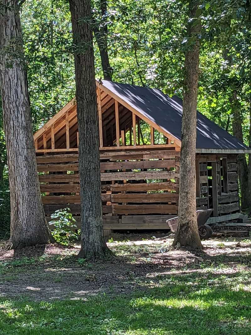 One Woman's Dream, Rebuilt Log By Log