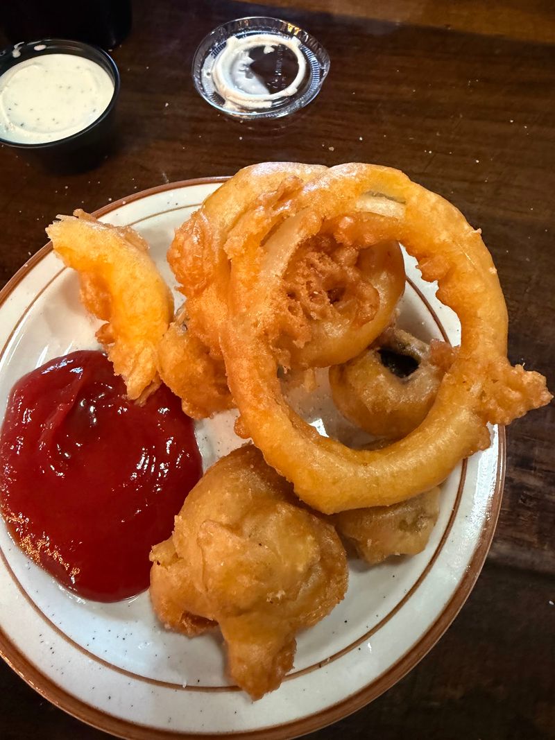 Onion Rings Stacked Like A Trophy