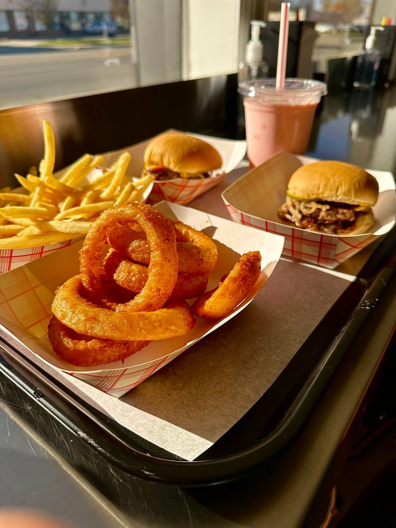Savor The Onion Rings And Shoestring Fries