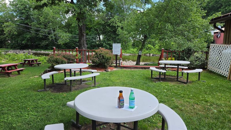 Outdoor Seating Next To A Genuine Historic Covered Bridge