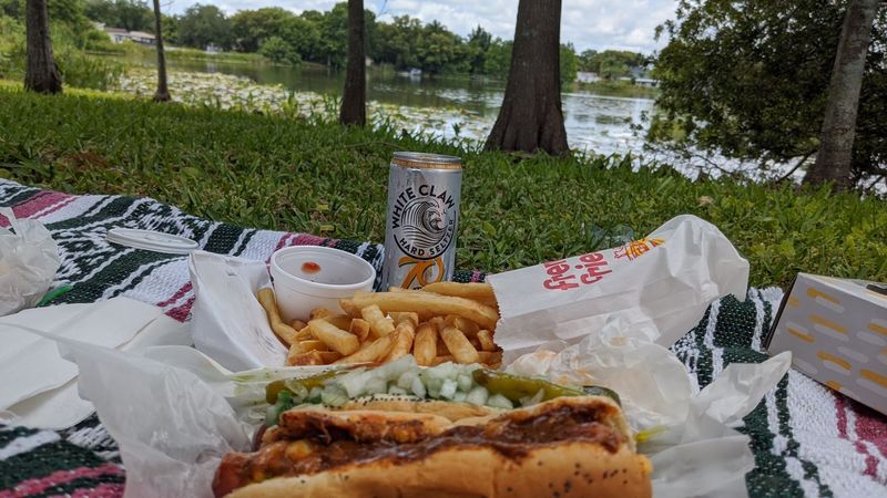 Outdoor Tables Near A Lovely Lakeside Park