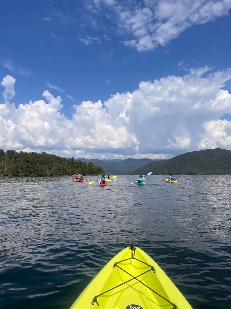Paddleboarding And Kayaking On Calm, Open Water