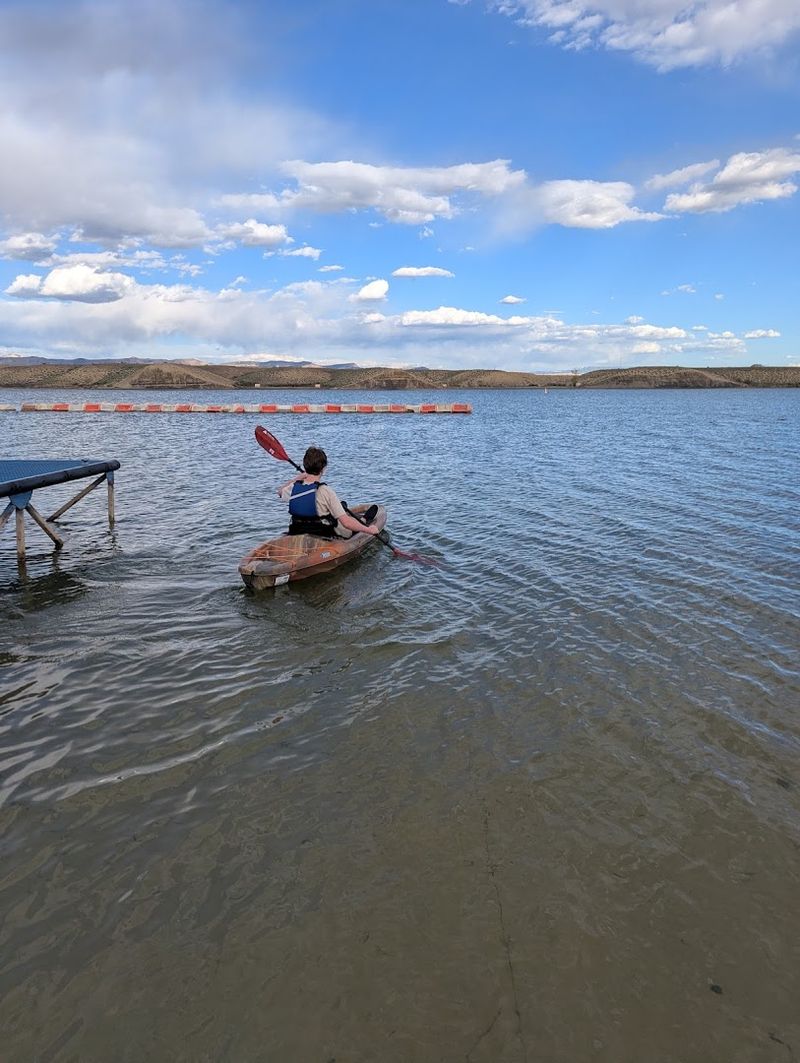 Paddleboarding And Kayaking On Open Water