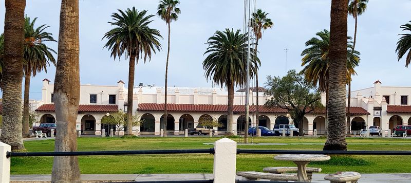 Palm Trees, White Arches, And A Plaza Worth Lingering In