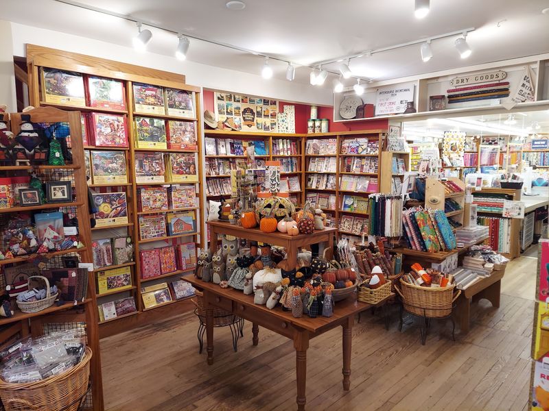 Patterns, Books, And Kits Stacked Everywhere