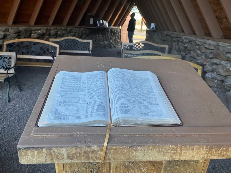 Pews, Books, And A Prayer Box Await Inside